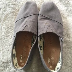 Barely worn grey toms 10.5 in women's